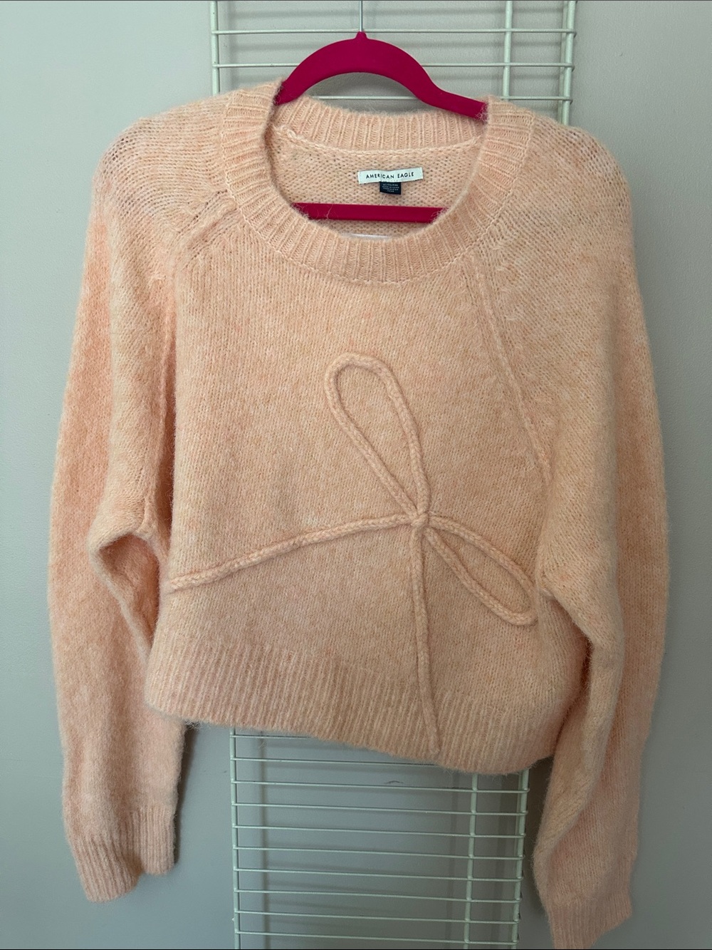 American Eagle Outfitters Peach Bow-Accent Crewneck Sweater